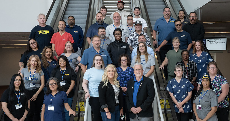 Health care sector attendees pose for a photo between conference sessions.